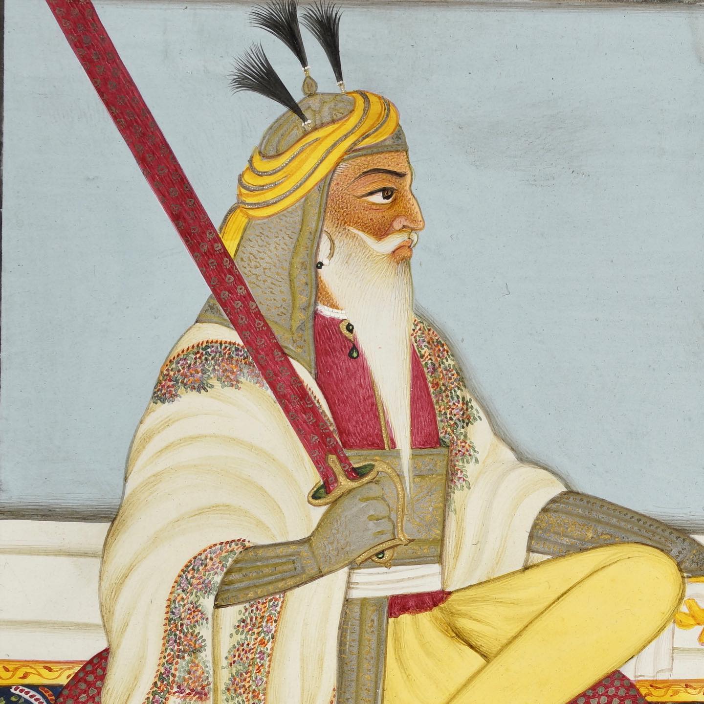 Painting of Hari Singh Nalwa seated in mail and helmet, a sword held across him.