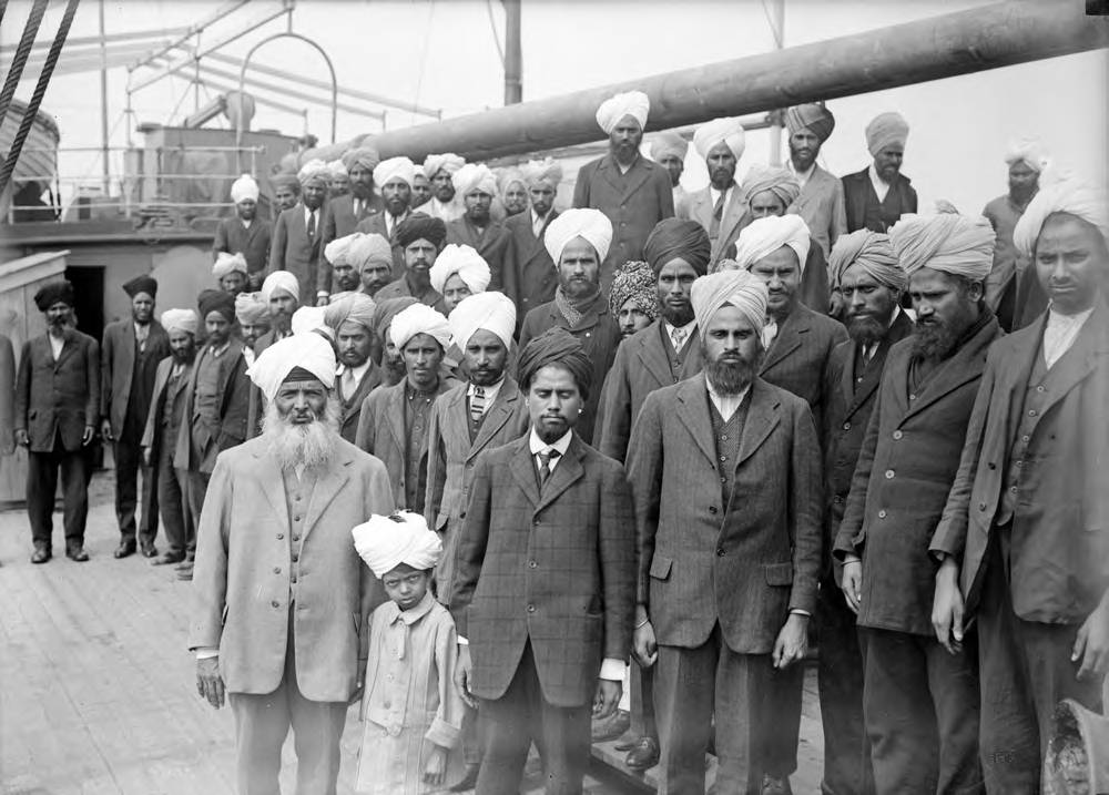 Passengers crowd the deck and rigging of the Komagata Maru in Vancouver harbour, 1914.